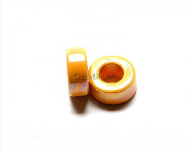 Ceramica. Rondel 23x10mm. amarillo irisado. Int.11mm aprox.