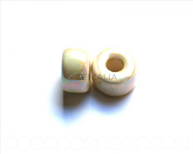 Ceramica. Rondel 18x10mm. crema. Int.6,2mm