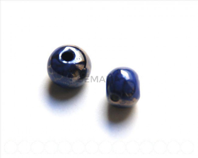 Ceramica. Bola 12mm. violeta oscuro. Int.3mm aprox.