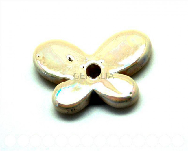 Ceramica. Mariposa 45mm. crema irisado. Int.4,5-5mm