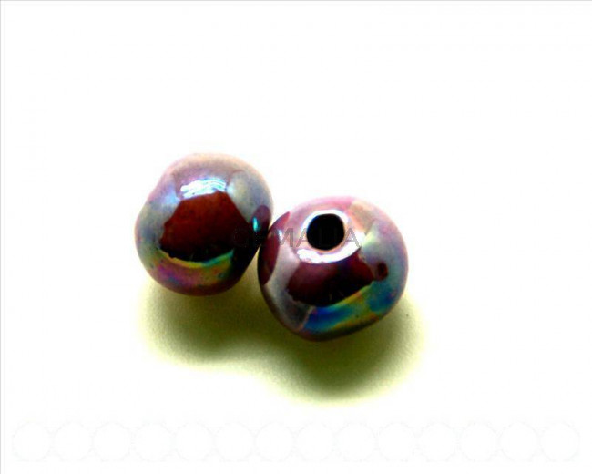 Ceramica. Bola 16mm. lila . Int.3,5-4mm aprox.