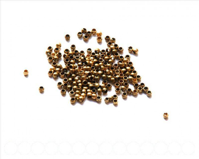 Cuentas metalicas. Chafa 2,5mm. Oro viejo