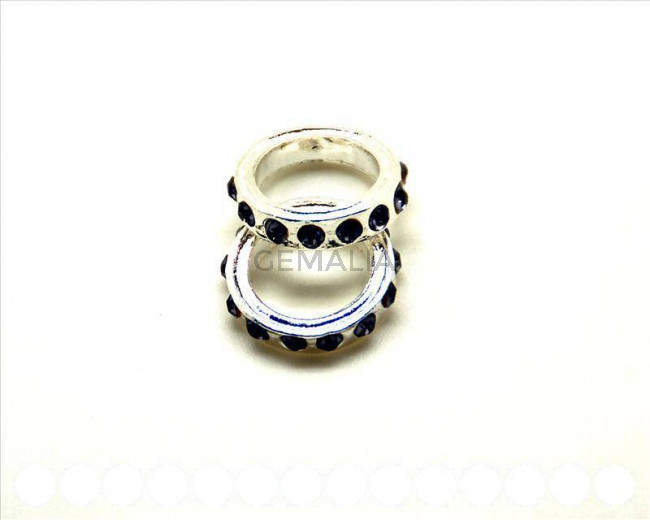 Metalico. Rhinestone 19x19x4mm. Plateado-tanzanite. Int.13mm aprox.