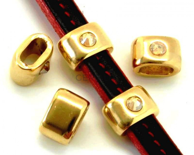 Entrepieza Zamak/SWAROVSKI. Media caña. Oval strass. 15x10mm. Oro-GoldShadow. Int10x5mm