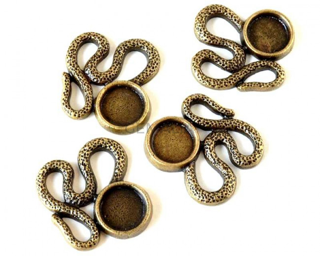 Zamak. Colgante. Serpiente. 34x33mm. Oro viejo. Int.piedra 12mm