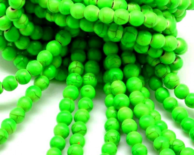 Turquesa sintetica.Bola 6mm.Verde fluor.Int.1mm aprox.