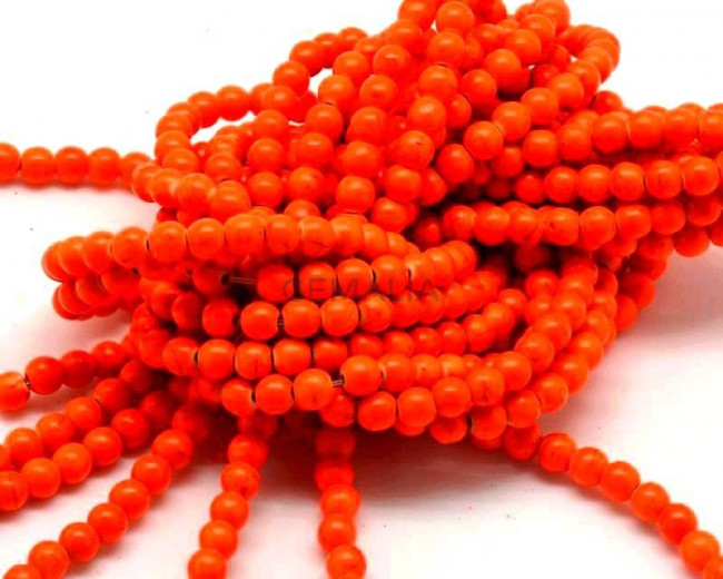 Turquesa sintetica.Bola.6mm.Naranja fluor.Int.1mm aprox.