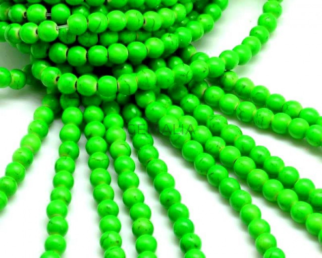 Turquesa sintetica.Bola.6mm.Verde fluor 2.Int.1mm aprox.