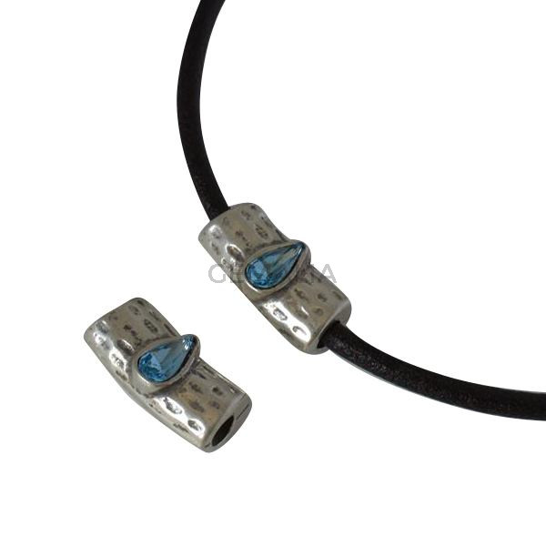 Tubo de SWAROVSKI y Zamak 24x12x8,5mm. Plateado-Aquamarine. Int.4mm