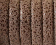 Piel de serraje REGALIZ. Oval 10x6mm . Motas marrón. Calidad superior