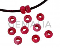 Resina. Rondel 6,5x6,5x4mm. Fucsia jaspeado. Int.3mm aprox. Calidad superior.
