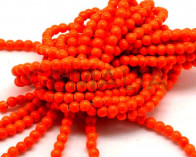 Turquesa sintetica.Bola.6mm.Naranja fluor.Int.1mm aprox.