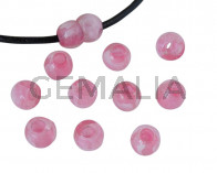 Resina. Bola 7x7x5mm. Rosa jaspeado. Int.3mm aprox. Calidad superior.
