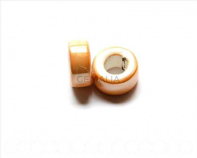 Ceramic. Rondell, 23x10mm. Oil light brown. Int.11mm.