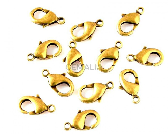 Brass. Lobster clasp. 11x19mm. Antique gold.