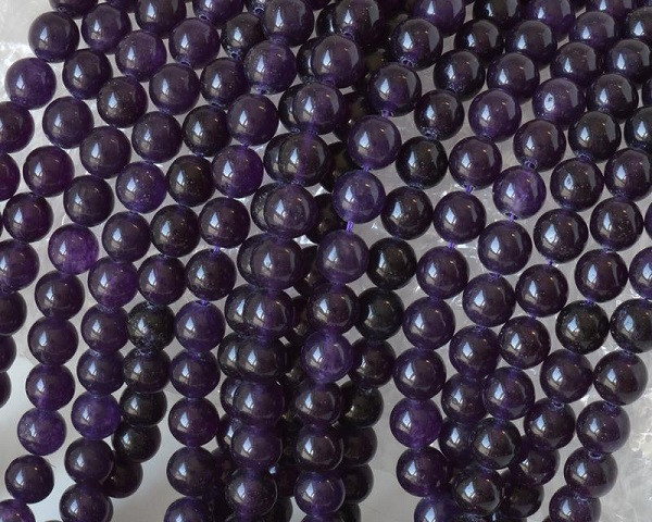Amethyst. Dyed. 8mm round. 16-inch strand.