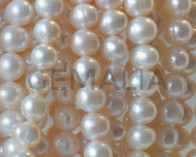 Cultured Freshwater. Round. 6-7mm. White.